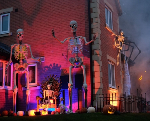 Alnwick Halloween House decorated with giant skeletons and colourful lights